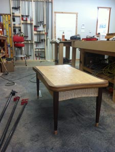 Rubus Woodworks Quilted maple table with walnut accents